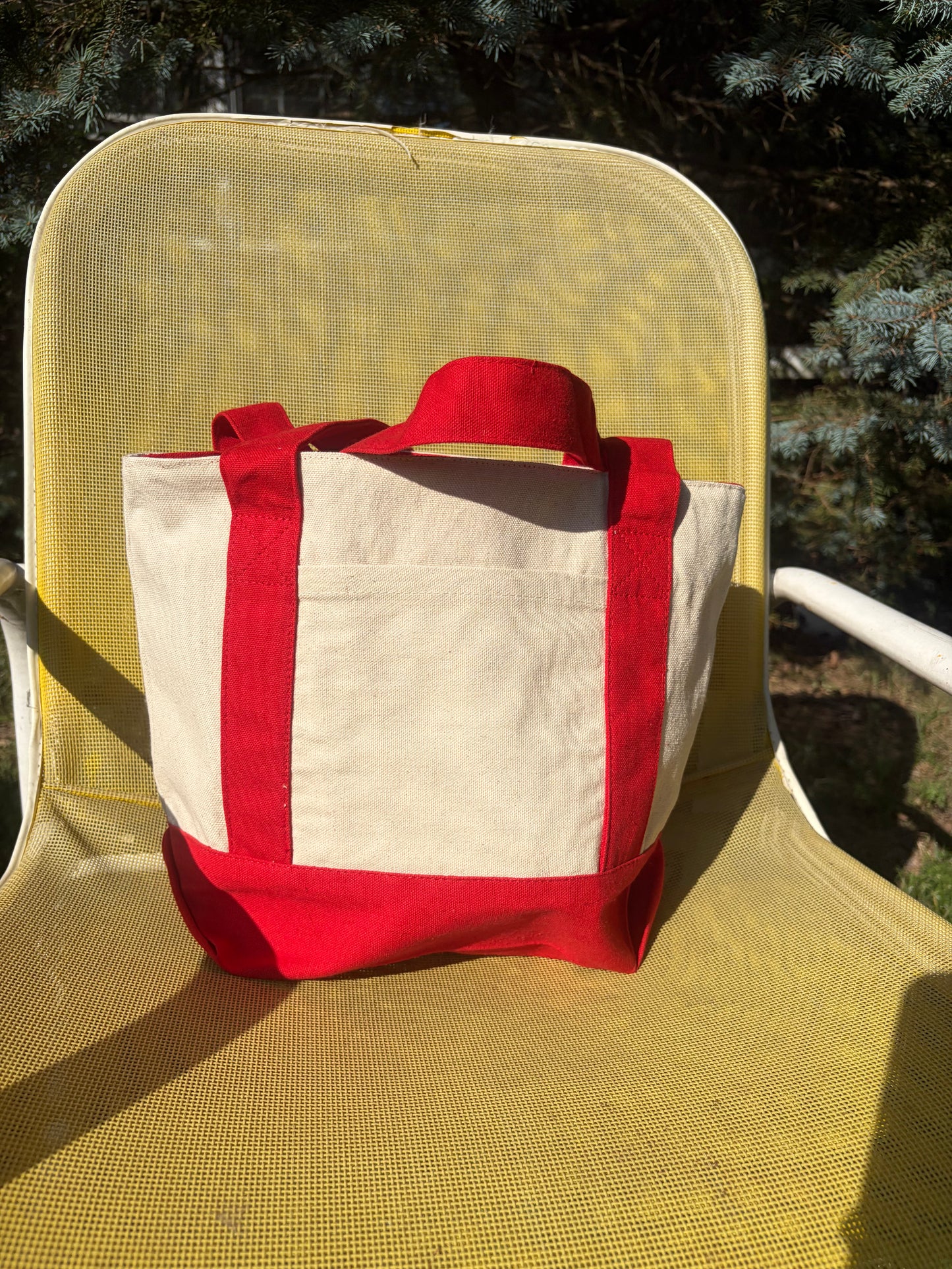 Small canvas tote with front pocket and zipper