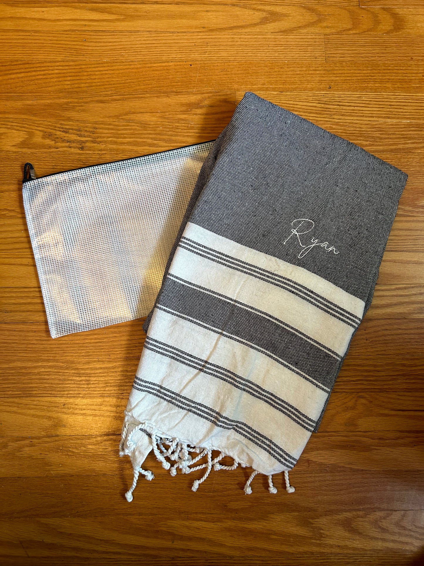 Beach towel and water resistant pouch set
